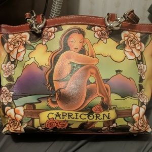 Isabella fiore capricorn zodiac leather purse